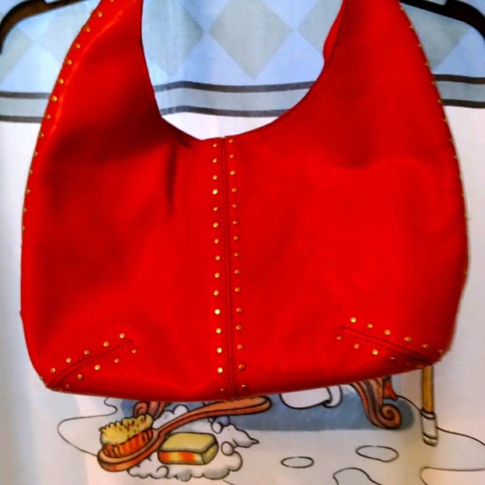 MK red medium bag. Has official printed lining.